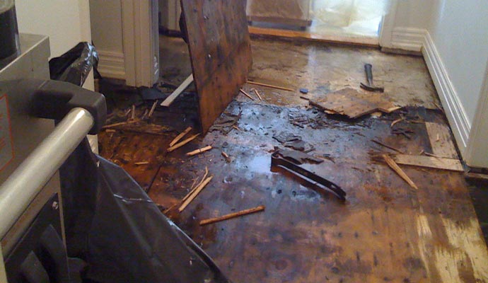 water damaged wooden floor