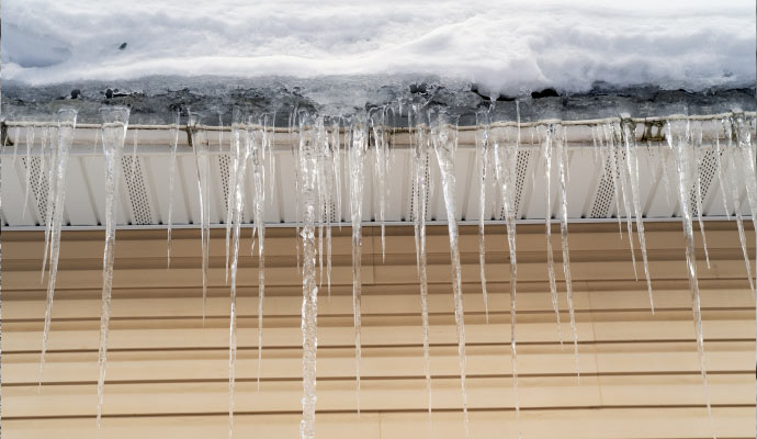 Snow and ice damaged roof